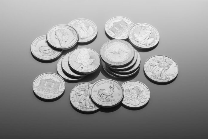 BetMGM-fined-Pennsylvania Coins on a grey surface