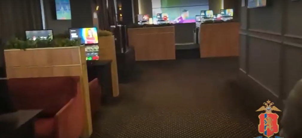 Inside a suspected underground Russian casino.