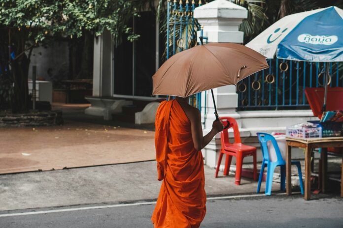 Leading Thai Abbot Disrobed in $9M Temple Funds Embezzlement, Gambling Probe