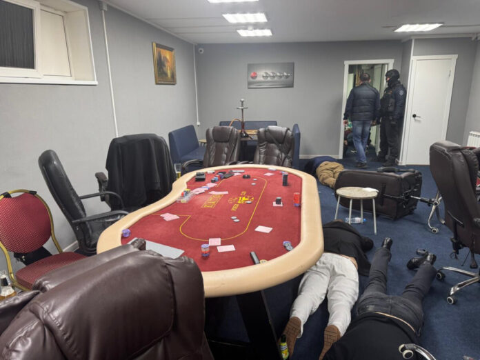 Police raid a suspected underground casino in Russia’s Telmana.