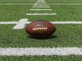 NFL ball on pitch